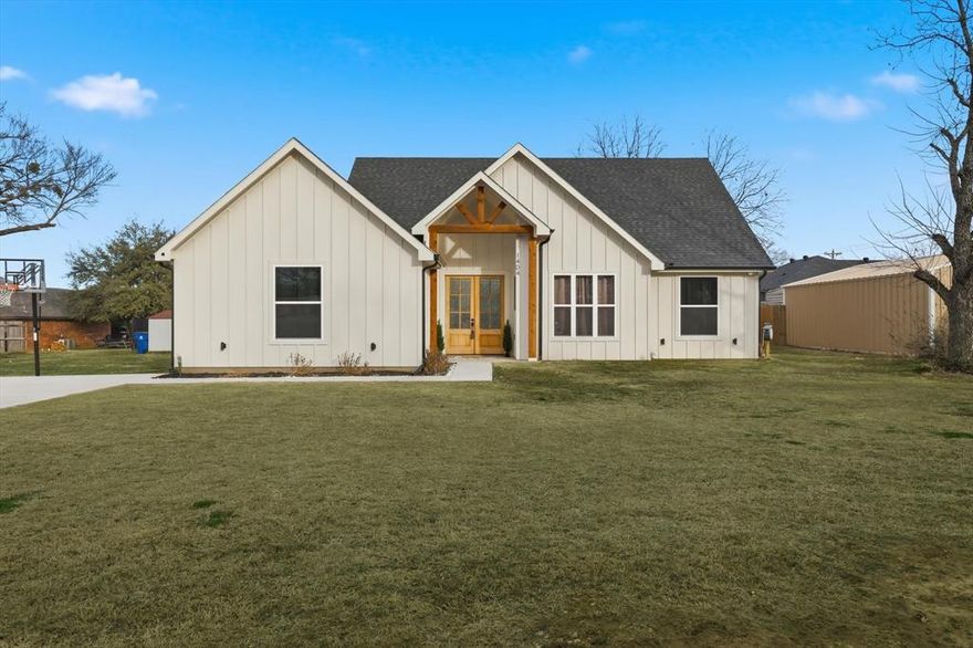 Welcome home to this spacious four-bedroom, two-bath residence offering a thoughtfully designed open-concept layout with a desirable split-bedroom floor plan. A striking double-door front entrance opens into a bright, light-filled living space that feels warm and welcoming. The kitchen is a true centerpiece, featuring quartz countertops, a large island, abundant cabinetry, a side pantry for extra storage, and a pot filler for added convenience. The private primary suite serves as a relaxing retreat, complete with a large walk-in closet and an oversized walk-in shower paired with a luxurious soaker tub. Sellers are in the process of fencing the backyard, creating a private and secure space, perfect for kids and pets to play. Modern design, functional space, and everyday comfort come together beautifully in this move-in-ready home. Conveniently located within walking distance to local schools as well as downtown eateries and entertainment!