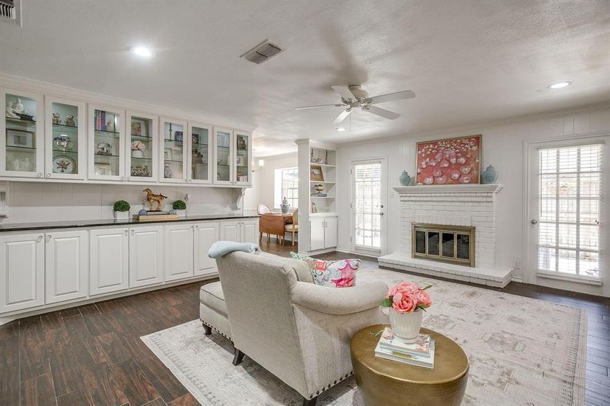 Discover the perfect blend of comfort, convenience, and security in this beautifully
updated first-floor condominium within the exclusive gated community at Indian Creek
Condominiums. The home has been remodeled to include wood ceramic tile floors, carpet, granite countertops, custom cabinetry and a closet
with washer and dryer connections. The home offers single-level living with no
stairs to navigate.
The open floor plan flows naturally from living to dining to kitchen, creating an inviting
space. The den-living room are the heart of the home, with a unique custom
glass display cabinet and marble counters for showcasing treasured collections, a cozy
wood-burning fireplace and a bright bay window. 
The kitchen makes meal preparation a pleasure with updated
modern stainless steel appliances and 
countertops. The breakfast nook overlooks the manicured private patio, perfect for
morning coffee and bird watching.
Both bedrooms offer comfortable retreats, while the two full bathrooms feature elegant
updates including decorative lighting, updated granite counters, updated shower door
and updated hardware. Throughout the home, you will appreciate the abundant storage
solutions and attention to functionality.
Two covered parking spaces (B72 & B73) are conveniently located directly
in front of the private back entrance, making grocery trips and daily errands convenient.
Indian Creek offers a secure community with tree-lined streets and professional
landscaping. The property offers its residents tennis and pickleball courts, two
community pools and clubhouse facilities. The location is minutes away from Shady
Oaks Country Club and NAS-JRB. The charming home is convenient to Central Market
Grocery Store, Fort Worth's renowned museums and dining scene, and the charming
boutiques along Camp Bowie.