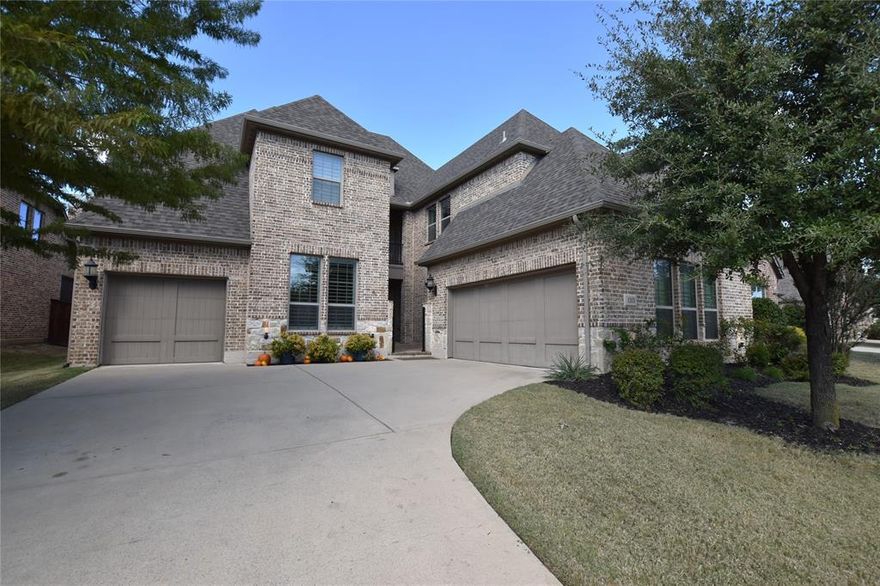 Welcome to a true destination neighborhood in N. Texas. This beautiful front drive 3 car garage home features a gated courtyard entry that is overlooked by an upstairs balcony. Walking through the front door you find a large living area flanged by a truly amazing kitchen. If you love entertaining this is the home for you. The kitchen boasts a huge island, pot filler, gas stove, glass uppers, granite countertops and gracious amounts of natural light! The large dining area features a fireplace and is attached to the kitchen and a large screened in patio that is accessible through 2 large telescopic sliding doors. This home is a multigenerational dream with ensuite baths in each bedroom, ground floor office, second floor family area, media room and half baths on each floor. The large first floor primary suite has an ensuite bath and a large walk in closet featuring bonus storage. Don't miss the restaurant, fitness center, 5 pools, fishing ponds, playgrounds, tennis and pickleball courts.