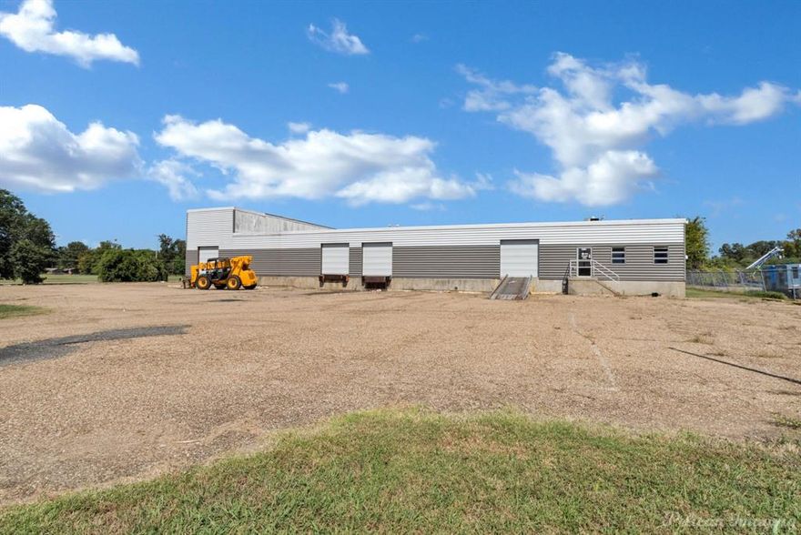 Centrally located warehouse on a corner.  5 loading docks with 10 ft. roll up doors, 4 separate offices plus breakroom. Was formerly used as cold storage facility.  Seller will consider leasing for $4,000 a month with a minimum 24 month lease.