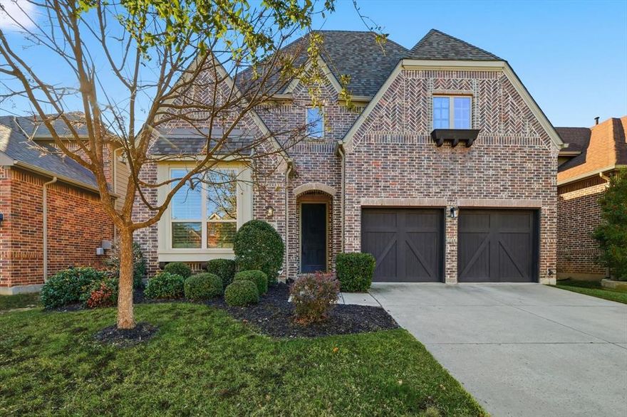 STUNNING HOME NESTLED ON A PICTURESQUE GREENBELT LOT, LOADED WITH LUXURY UPGRADES! Prepare to be impressed by this beautifully appointed residence, styled to perfection and designed for both elegance and everyday comfort. Step inside to discover extensive hand-scraped wood flooring, wrought iron spindles, plantation shutters, crown molding, and soaring ceilings that create a grand yet inviting atmosphere. A striking floor-to-ceiling stone fireplace anchors the open-concept living area, while a recently replaced roof adds peace of mind. The gourmet kitchen is a true showpiece, featuring granite countertops, stainless steel appliances, a 5-burner gas cooktop, under-cabinet lighting, a spacious island with a breakfast bar, and a pantry outfitted with a built-in spice rack. Retreat to the luxurious downstairs primary suite offering a dual-sink extended vanity, soaking tub, separate shower, linen closet, and an impressive walk-in closet. Upstairs, enjoy a wealth of additional living space with a generous game room, a private media room, and secondary bedrooms—each offering walk-in closets for exceptional storage. For those who work from home, the stylish office makes a statement with marble flooring and French doors. Step outside to your private, tree-lined backyard oasis backing to a serene greenbelt. With gravel side yards, abundant room for outdoor fun, and a large covered patio complete with a ceiling fan and gas stub for a grill, this space is ideal for gatherings or quiet evenings outdoors. Boasting epoxy flooring, the 2-car garage makes parking convenient and secure. Lantana residents enjoy resort-style living with pools, fitness centers, new pickleball courts, trails, and top-rated schools—just minutes from premier shopping and dining. 9328 Kaitlyn Court is a gorgeous home that offers luxury, comfort, and lifestyle—all in one perfect package. Don’t miss this opportunity to make this beautiful home yours!