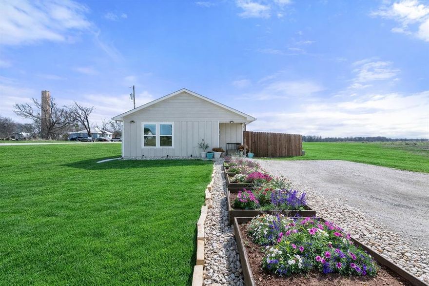 Get out to the fresh air of the country and still have easy access to Waco AND Fort Worth! This charming and move-in ready 3-bedroom, 2-bath home in the darling community of Itasca! This light and bright property offers an inviting open layout with abundant natural light throughout. The spacious living area flows seamlessly into the kitchen and dining space, creating a warm and functional setting for everyday living and entertaining. The primary suite features its own full bath, while two additional bedrooms provide flexibility for guests, a home office, or growing households. Step outside to enjoy the fully fenced backyard — perfect for pets, play, or relaxing evenings under the Texas sky. With plenty of room to garden or entertain, this outdoor space is a true highlight. Located in the welcoming small-town community of Itasca, you’ll enjoy charming local shops, hometown dining, community events, and nearby parks. Experience the peaceful pace of small-town living while still being conveniently close to larger city amenities. Don’t miss this opportunity to own this fantastic home!