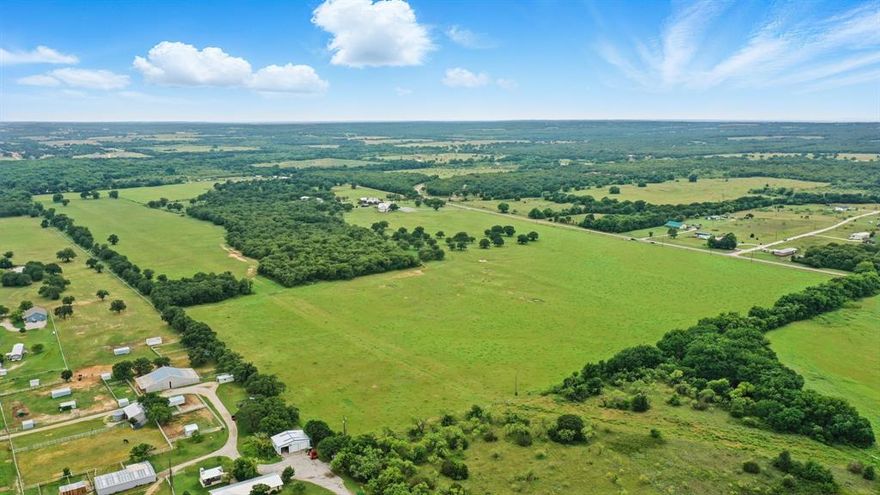 Spanning over 202 acres, this expansive property offers prime opportunity for agriculture, livestock, or future development. With a mix of cleared pasture, scattered mature trees, and full perimeter fencing, it’s ready to support cattle, horses, or a custom ranching operation. Located just off FM 2210, this land combines wide-open space with convenient access. Whether you're expanding your existing operation or building your vision from the ground up, this property is a rare find with AG exemption in place and no known restrictions.