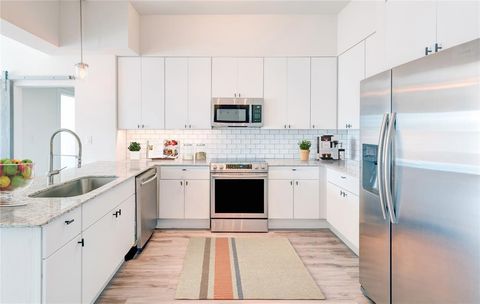 Photo of 117 Priddy Lane #306, Fort Worth, TX 76114 (MLS # 21275757)