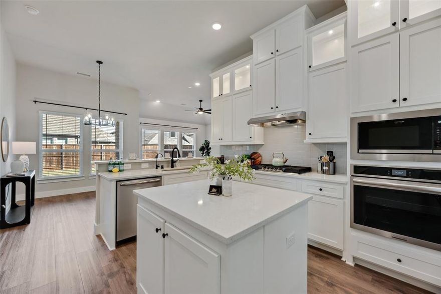 Discover an unmatched level of comfort & elegance in this charming home in the exceptional community of Edgewood Creek of Celina. This 4 bedroom, 3 bath single story well-maintained like new home boasts ample space & beauty at one of the BEST VALUES in PROSPER ISD! Offering the appeal of small town living, but all the conveniences of a close proximity to retail & major transportation hubs, this home exudes prime location! Enter to soaring ceilings, open balconies, alluring wood floors, window treatments throughout, tasteful finishes & inviting natural light. A spacious & private study or bedroom and bathroom with a full sized shower as well as a beautiful dining room is just off the entry, making it ideal for working from home or hosting guests. The open concept floor plan makes gathering & everyday living seamless as a beautiful breakfast nook overlooks the kitchen and living room. A stately rectangular modern gas fireplace, large windows, a stunning gourmet kitchen with plenty of cabinet space, gas cooktop, SS appliances, & a French door touch screen FRIDGE INCLUDED are just some of the highlights of this incredible home! An oversized primary bedroom & its spa like bathroom are ideal for creating the retreat & resting place you deserve! This gorgeous primary bathroom is complete with a freestanding tub, walk in shower, and his and her sinks. Sizable secondary bedrooms easily accessible to bathroom. This home truly is perfect for easy living and move in ready. Outside experience the beauty of TX sunsets from your covered porch and spacious yard. WASHER AND DRYER ALSO INCLUDED!!! Community offers ample walking and bike trails, community pool, park and amenity center. Conveniently located near popular attractions like Lake Ray Roberts and Lake Lewisville. Prime location near DNT, retail & grocery stores, dining and entertainment in Frisco & Plano. This home is truly a haven of charm & comfort, offering an unmatched living experience.