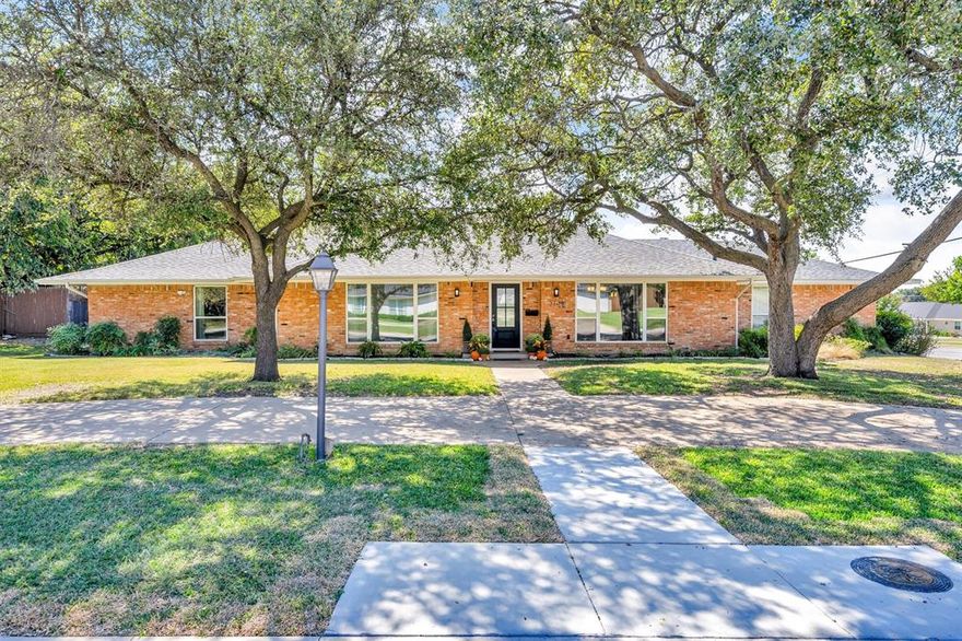 Modern living meets timeless style in the sought after private school corridor.
Set on nearly half an acre and framed by mature trees, this beautifully reimagined 3-bedroom, 3.5-bath home offers a perfect blend of luxury, comfort, and versatility. A circular drive and welcoming façade create an elegant first impression, while inside, the open, light-filled layout features rich hardwood floors and flexible spaces designed for modern living—including an office that can easily serve as a fourth bedroom.

At the heart of the home, the chef’s kitchen showcases high-end stainless-steel appliances, custom cabinetry, quartz countertops, an oversized island, and a spacious walk-in pantry. Multiple living and entertaining areas flow effortlessly to the outdoors, where walls of windows overlook the sparkling diving pool and lush, landscaped yard. Step outside to your private retreat with a fire pit seating area, mature trees, and an herb garden—perfect for relaxing or entertaining year-round.

The serene primary suite offers direct access to the backyard and features a spa-like bathroom with dual vanities,  spacious shower, and dual closets. Thoughtful design details throughout include excellent storage, built-ins, and well-planned functionality that enhance everyday living.

Located in the highly desirable private school corridor, this home combines prime location, sophisticated design, and effortless livability—just minutes from premier dining, shopping, and major thoroughfares.