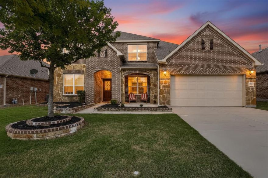 Experience elevated living in this stunning home zoned to Keller ISD. From the moment you enter, you’re welcomed by rich hardwood floors and a light-filled, open concept design that effortlessly connects the kitchen, dining, and living spaces; perfect for both everyday living and entertaining. At the heart of the home, the gourmet kitchen impresses with an expansive 12-foot island, granite countertops, and a charming farmhouse sink, creating a space that’s as functional as it is beautiful. The primary suite offers a true retreat, complete with a custom California closet designed for both luxury and organization.  Thoughtfully curated modern finishes carry throughout the home, while the flexible floor plan includes an optional fifth bedroom or private office to suit your lifestyle. Upstairs, the game room and media room provide the ultimate setup for entertaining or relaxing nights in.Step outside to your extended covered patio overlooking a peaceful greenbelt—an ideal backdrop for outdoor living and unwinding. The three-car tandem garage ensures plenty of space for vehicles, storage, or hobbies. Residents enjoy access to exceptional community amenities, including a resort-style pool, splash park, dog park, scenic trails, and neighborhood parks—offering something for everyone.