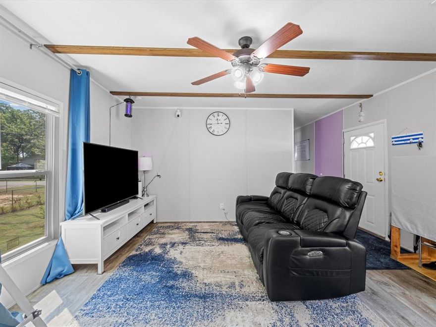 Welcome to your new home! This 2024 three-bedroom, two-bath manufactured home offers 1,216 sq. ft. of easy, comfortable living on a large fenced lot with plenty of room to enjoy the outdoors. The layout is open and inviting, with a bright living area and a kitchen that gives you lots of workspace, cabinet space, and a handy island for everyday meals or gathering with friends. Outside is where this place really shines. The shed stays, the above-ground pool (installed this summer on a concrete pad) stays, and the sellers have created a sweet gardening spot with plants and even a fruit tree already started for you. It’s a great setup if you enjoy being outside or want space to grow more. You’ll also have a carport, washer and dryer purchased in June 2024, refrigerator, and the peace of mind of city water and sewer. The subdivision has minimal restrictions, giving you flexibility without losing a neighborhood feel. Best of all, you’re just a short drive from Cedar Creek Lake, plus local schools, shopping, and dining. It’s a great price point for anyone looking for a comfortable home with plenty of extras and outdoor space. Come take a look, you’ll feel right at home the moment you arrive.