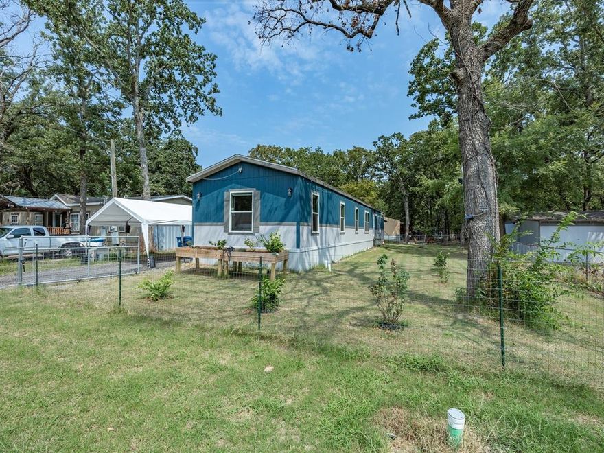 Welcome to your new home in the Wood-Wilks Gardens subdivision! This property features 3 bedrooms, 2 bathrooms, and 1,216 sq. ft. of thoughtfully designed living space. Inside, you’ll find modern lighting and energy-efficient windows that create a bright and inviting atmosphere. The open-concept layout offers a spacious living area and a stylish kitchen with a large island, stainless steel appliances, and plenty of cabinet space—perfect for daily living and entertaining. Extras include a washer and dryer purchased in June 2024, a refrigerator, a beautiful backyard shed that matches the home, a new above-ground pool set on concrete (purchased this summer), a carport, and even a fruit tree in the backyard. With city water and sewer already in place, this home is move-in ready. Located just minutes from highly rated schools, shopping, dining, and Cedar Creek Lake Reservoir, it offers both comfort and convenience. Don’t miss your chance to own a modern home with thoughtful upgrades in a fantastic location!