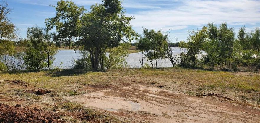 Looking for that water front property? Look no further. Here's a generous double lot of 17,050 sf lot ready for your new stick built home or mobile home! There were previously two mobile homes here, two lots. Close to the new Data Center too. 
Great rental opportunity or to live in. 
Buyer to verify what can be put or built there.
