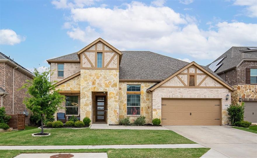 Located in prestigious Argyle ISD, this beautifully designed 4-bedroom, 3.5-bath home offers a flexible open-concept floor plan ideal for entertaining, multi-generational living, or work-from-home lifestyles. Spacious living areas create a natural flow between the family room, kitchen, and gathering spaces, perfect for hosting family and guests. Situated on a generously sized lot with a large backyard, there is ample space for a future pool, outdoor kitchen, play space, or custom outdoor living area. Durable flooring throughout provides both modern style and low-maintenance functionality.Enjoy exceptional energy efficiency upgrades, including a solar panel system with battery backup, helping reduce utility costs and providing peace of mind during power outages, plus spray foam attic insulation for year-round comfort. The insulated garage with mini-split HVAC offers a versatile climate-controlled workspace ideal for a home gym, workshop, hobby room, or additional storage. Conveniently located near the elementary school, Adventure Park, community pool, walking trails, and neighborhood amenities, this home combines top-rated schools, energy efficiency, flexible living space, and prime community location—everything today’s buyers are searching for.