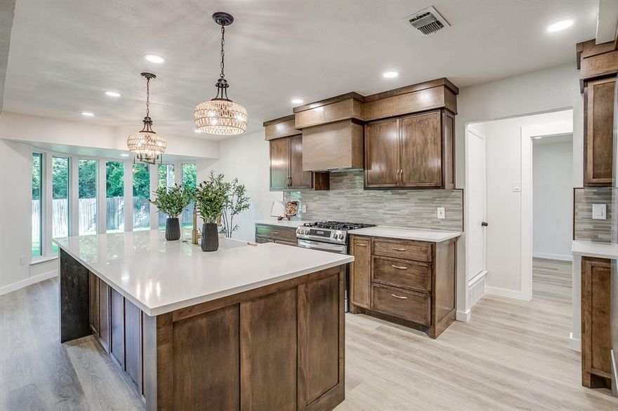 Motivated Seller, Seller Offering $10k in Seller Concessions!Seize this rare chance to snag a fully remodeled stunner in Fort Worth. This move-in-ready masterpiece is a dream for first-time buyers, growing families, or savvy investors chasing hot Fort Worth real estate. Act now offers flying in won't wait! Imagine stepping into a vibrant open-concept haven lit by recessed lighting and new energy-efficient windows pouring in tons of natural light. The chef-inspired kitchen steals the show with custom soft-close cabinets, gleaming quartz counters, top-of-the-line stainless appliances (gas range, microwave, dishwasher included!), Massive island featuring a farmhouse sink, chic subway tile backsplash, and a custom wood hood vent perfect for epic meals and gatherings in this remodeled dream kitchen! Escape to the lavish primary suite: a private paradise with a cozy sitting nook, built-in vanity for work or glam, and dual walk-in closets. The spa-worthy master bath dazzles with veined large-format tiles, double wood vanities, a walk-in shower with clever niches, and premium fixtures. Plus, a flexible bonus room rocks a bold hexagonal tile accent wall and geometric trim, ideal as a home office, formal dining space, or 4th bedroom! Newer Roof, HVAC, and water heater for less worries. Ceiling fans everywhere! A striking stone fireplace for cozy vibes and a chic wet bar with sink, wine fridge, shelves, and hexagon backsplash for ultimate entertaining! Tucked in a serene cul-de-sac, enjoy a spacious fenced yard with covered patio, lush grass, shade trees, and room for BBQs, pets, or play. Your ultimate backyard oasis! Classic brick exterior, 2-car garage, and prime spot near top-rated schools, shopping centers, dining hotspots, parks, and major highways. Motivated Fort Worth's market is on fire! This turnkey gem with luxury vinyl plank floors, modern fixtures, custom features, energy-efficient upgrades, and endless wow-factor won't last! View today and make it yours!