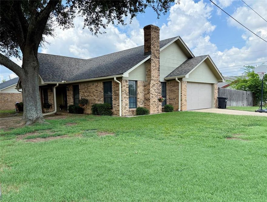 Welcome home! This beautifully maintained 3-bedroom, 2-bath home sits on a spacious corner lot in a desirable neighborhood, offering the perfect blend of comfort and convenience. Enjoy daily walks to Coleman Park, where you can feed the ducks, stroll or jog around the lake, or relax with a picnic by the water. You’ll love spending time outdoors on the covered patio—perfect for your morning coffee or unwinding in the evening. The friendly neighborhood atmosphere makes it easy to meet others out walking, running, or biking each day.

Inside, this home offers a warm and inviting feel with updated flooring throughout and a large living room featuring a vaulted ceiling and propane gas log insert, creating the perfect space to gather on cool Texas nights. The kitchen and living spaces flow easily, making the home ideal for entertaining or everyday living. Outside, you’ll find a large storage building complete with electricity and AC—perfect for a work-from-home setup, hobby space, she-shed, or man cave.

Recent updates include a new roof (2023), a newly built back patio cover (2023), and a new garage door (2020), giving you peace of mind for years to come. Conveniently located near schools, downtown, and area shopping, this property offers both comfort and convenience in one. Come make this house your home!