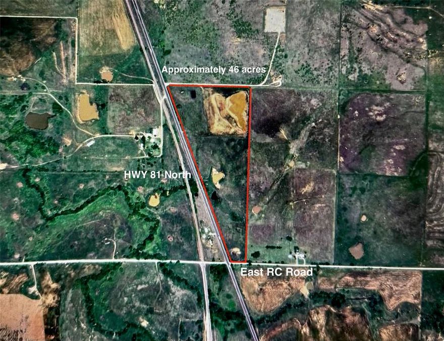 46 Acres AG EXEMPT land with over 2800 feet of HIGHWAY FRONTAGE!!!  Approximately 40 acres sprigged in coastal and approximately 6 acres planted with wheat. 2 Tanks for watering as well as TWO HIGH PRODUCTION WATER WELLS WITH CAPABILITY of producing 100 gallons per minute and electricity on property.  Seller has maintained agricultural exemption with cattle.  Property has shed for storage.  Opportunities are endless here as subdividing would allow for multi family residences and or manufactured home park or keep it in ag use with the perfect set up!