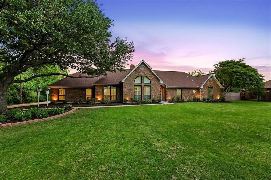 Beautifully updated and set on just over 1 acre in highly desirable Southlake this 5 bedroom 4 bath home offers space style and an unbeatable location in award winning Carroll ISD. With no HOA and easy access to Grapevine Lake parks, trails, boating, Southlake Town Square shopping, dining and DFW Airport. This property gives you the freedom to enjoy the lifestyle buyers are looking for.

Inside you will find two spacious living areas that give everyone room to spread out whether you need space for entertaining relaxing or working from home. The main living room makes a statement with soaring ceilings detailed millwork and a striking fireplace. The kitchen is bright and inviting with generous counter space an island breakfast bar double ovens and abundant cabinetry all opening to the living and dining areas for easy everyday living.

The oversized primary suite offers a peaceful retreat with a large bath featuring dual vanities a separate shower soaking tub and an impressive custom closet. Secondary bedrooms are well sized and the flexible layout works beautifully for guests or multigenerational living.

Step outside and enjoy your own backyard escape with a sparkling pool and spa covered patio and plenty of green space to play garden or simply enjoy the privacy of the oversized lot. A balcony overlooks the backyard and adds even more charm to the outdoor setting.

If you have been searching for a property with top rated schools a large lot and plenty of living space this one is definitely worth a look.