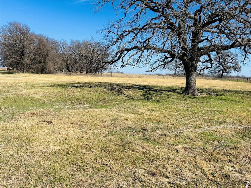 Nearly 12 acres ready to build on! This property offers a customizable barndominium shell dried in to be built, which the price is reflecting.There are no known restrictions, giving you the freedom to build and develop as you choose.The contractor is bonded and insured and does require 10% upfront.
Water is available — you’ll just need to install a meter — and electricity is already at the road. The land is completely fenced and has a  current AG exemption in place and ready for you to create your own homestead.
Located just minutes from the Brazos River and within Aquilla ISD, this property offers peaceful country living with plenty of space and potential.Call today to schedule your tour!