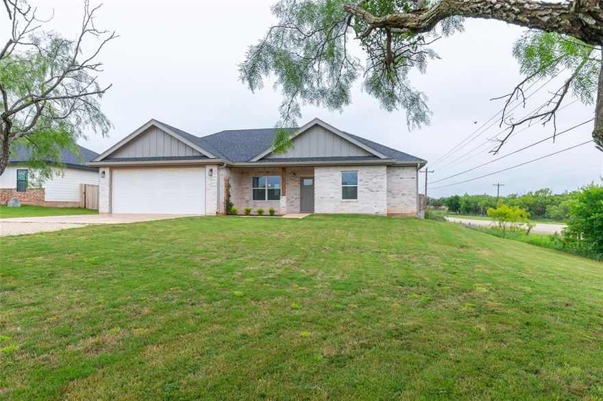 Beautiful 3-bedroom, 2-bath home located in sought-after Jim Ned ISD! This home offers a spacious open-concept floorplan that seamlessly connects the living, dining, and kitchen areas—perfect for everyday living, entertaining guests, or keeping everyone connected. Tall ceilings throughout enhance the bright and airy feel, while durable LVP flooring throughout the entire home provides both style and easy maintenance. Enjoy quality finishes throughout, including granite countertops in the kitchen and both bathrooms. The kitchen is equipped with stainless steel appliances, a stylish tiled backsplash, and a large center island with additional storage and prep space. The secondary bedrooms are generously sized, along with a well-appointed guest bathroom that provides comfort and functionality for family or visitors. Situated on a desirable corner lot, the exterior offers a spacious backyard with a privacy fence—ideal for pets, play, or outdoor gatherings—plus a sprinkler system to help keep the lawn looking its best year-round. This move-in-ready home combines modern finishes, functional design, and a fantastic location all in one!