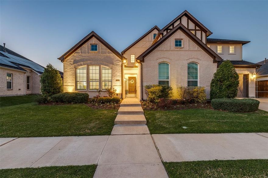 Experience refined living in this exceptional residence located within the prestigious guard-gated Lexington community. Showcasing one of the builder’s most sought-after floor plans, this home blends timeless elegance with modern comfort, featuring extensive upgrades, sophisticated finishes, and a thoughtfully designed layout.
A private courtyard welcomes you into a home defined by light and scale, where soaring ceilings, exposed beams, and expansive windows create an airy, open-concept living experience. Rich hand-scraped oak hardwood floors and curated designer details elevate every space.
Designed for both everyday living and multi-generational flexibility, the home offers two primary suites on the main level, along with an executive study featuring French doors and tranquil courtyard views.
At the heart of the home, the chef’s kitchen is equipped with a gas cooktop, double ovens, quartz countertops, soft-close cabinetry, and a fully appointed butler’s pantry with built-ins and wine fridge. The kitchen flows seamlessly into the inviting living area, anchored by a statement fireplace.
A first-floor media room provides an ideal space for entertainment, while the owner’s retreat offers a spa-inspired bath and dual walk-in closets with direct laundry access.
Upstairs, a spacious game room and well-appointed bedrooms with ensuite baths ensure comfort and privacy for family and guests.
Set on an oversized lot, the expansive backyard and covered patio create the perfect setting for outdoor living. Residents enjoy access to resort-style amenities, including an Olympic-sized pool, clubhouse, fitness center, and playground, all within walking distance to a highly rated Frisco ISD schoolS. A rare opportunity to own a true showcase home in one of the area’s most desirable communities!!
*** 3D Interactive Matterport Available***
