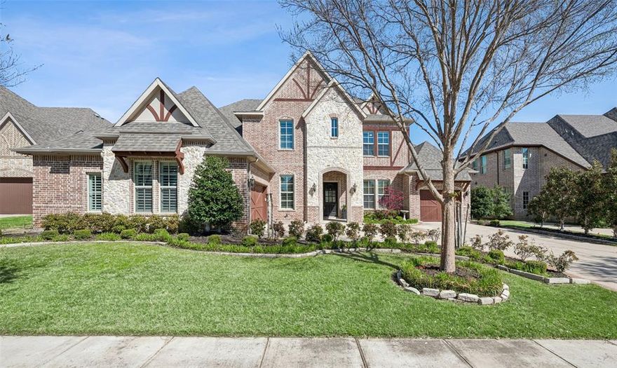 Welcome to this stunning 5-bedroom, 5.1-bath home located in the highly sought-after Carroll ISD. Filled with natural light, this home features a dedicated office with a built-in desk and custom cabinetry—ideal for working from home.

The chef’s kitchen is designed to impress, boasting stainless steel appliances, a gas cooktop, double oven, a spacious island with bar seating, and a stylish coffee bar complete with a wine cooler. A well-appointed laundry room with cabinets and a sink adds everyday convenience.

The inviting living room offers a cozy fireplace and picturesque views of the backyard pool. The primary suite provides a private retreat with a spa-like bath featuring dual vanities, a soaking tub, and a separate walk-in shower.

Enjoy movie nights in the media room or relax on the balcony overlooking the outdoor oasis. The backyard is built for both fun and relaxation, featuring a sparkling pool, an in-ground trampoline, and backing to a park with scenic walking trails for added privacy and beauty.

Residents enjoy exceptional community amenities including a clubhouse, pool, fishing areas, and lake—perfect for an active lifestyle.