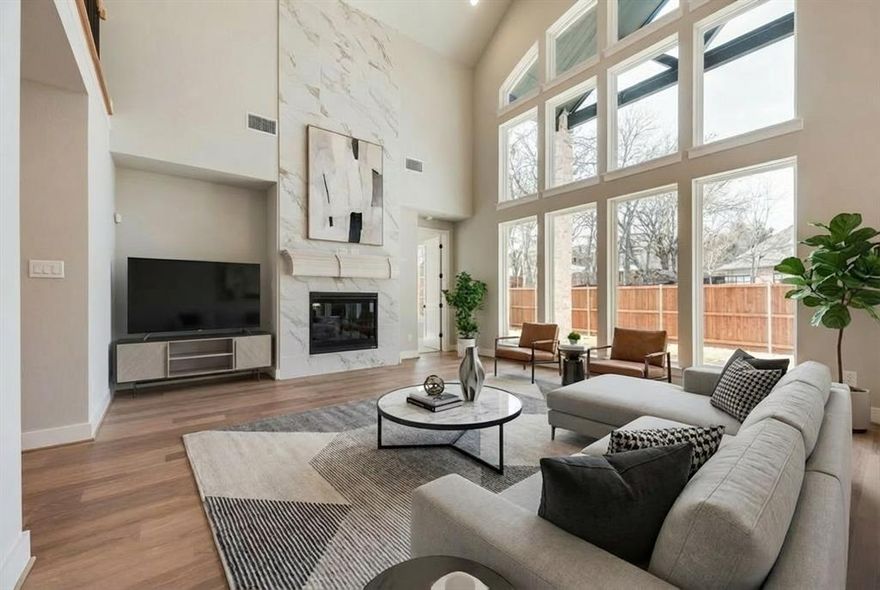 Welcome to this beautifully crafted, brand-new five-bedroom home in the desirable Providence Cove community JUST COMPLETED. Ideally located just off the Sam Rayburn Tollway, this home offers unmatched access to shopping, dining, and top-rated schools, along with neighborhood amenities including pickleball courts, a tranquil lake, and direct access to the McKinney Trail system. Step inside to a grand entryway with double front doors highlighted by a dramatic curved staircase that sets a sophisticated tone. A spacious family room featuring vaulted ceilings and a 2 story fireplace with tile stretching to the ceiling. The open-concept kitchen is a chef’s dream, complete with a large island, slab countertops, Shaker-style cabinetry, stainless-steel appliances, a five-burner gas cooktop with custom vent hood, pots and pans drawers, and a stylish tile backsplash. Downstairs media room and a home office or formal living. Upstairs gameroom & Children’s Retreat bonus room.  
Throughout the home, 8-foot interior doors, a modern front entry, rich wood floors, and a full oak staircase with wrought iron balusters enhance the sense of luxury. A private guest suite on the main level offers flexibility for visitors. The elegant primary suite includes a freestanding soaking tub, dual vanities with wall mirrors, a walk-in shower with designer tile, and his & her separate walk-in closets. A covered back patio is ready to entertain.
Designed with comfort and efficiency in mind, the home includes a built-in security system, sprinkler system, tankless water heater, R-38 insulation, and Energy Star certification.
This home blends modern design with everyday functionality in a thriving, connected community. Don’t miss your opportunity to own this stunning new construction home. Energy Star certified for low energy bills.