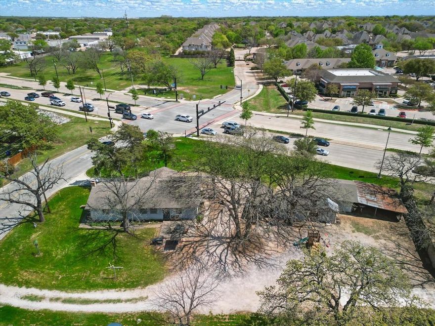 High visibility corner lot with over 20,000 VPD. Surrounding properties zoned PUD and CC1 ready for buyer to rezone to CPO or Office (currently AG). Buyer to rezone for any other use than current residential use. To confirm rezone allowance for any planned use, the buyer to contact City of Colleyville Planning and Community Development. For driveway access question on HW26, contact TxDot. City water and sewer are close by; contact City of Colleyville to confirm the exact location. Buyer to purchase new survey if existing survey is not acceptable. Buyer to confirm all details. Do not access the property without approval from the listing agent, and do not disturb the existing tenant.