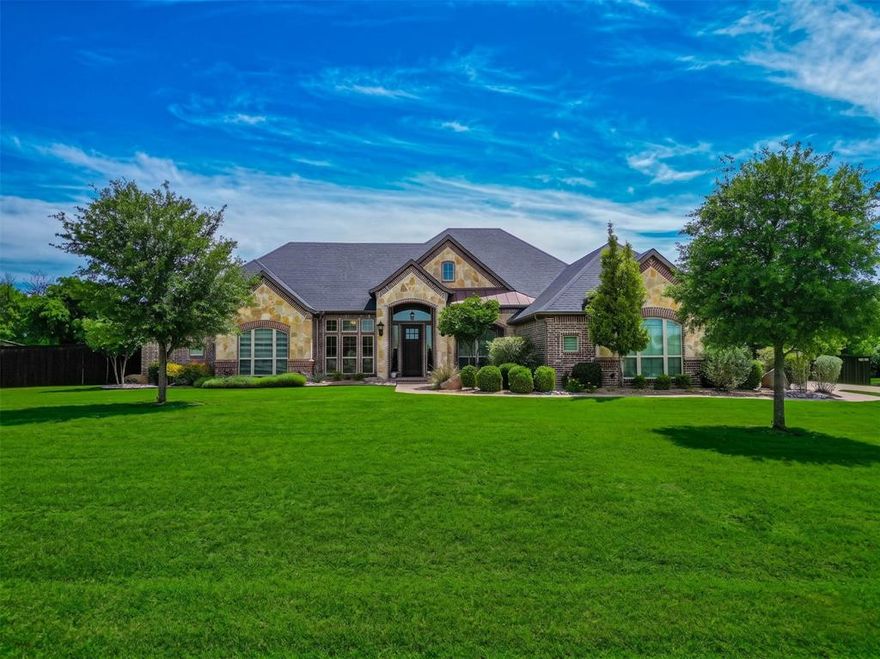 Beautifully appointed former model home by AGC Custom Homes, ideally situated in a sought-after Midlothian community and zoned to top-rated Midlothian ISD schools. This 4-bedroom, 3-bath home offers 2,763 sq ft of thoughtfully designed living space on a spacious 1-acre lot. Step inside to an open-concept floor plan featuring over sized rooms, a functional layout, and upscale finishes throughout. The heart of the home showcases a stunning double island kitchen—perfect for entertaining—alongside generous living and dining spaces. A versatile flex room provides endless possibilities as a media room, game room, additional living area, or even a 5th bedroom. Outdoors, enjoy your private backyard retreat complete with a beautiful pool (just 3 years old) featuring umbrella inserts and a volleyball setup—ideal for both relaxing and entertaining. The cozy outdoor living area with fireplace creates the perfect setting year-round. Additional highlights include a 3-car garage, recently updated landscaping, and convenient access to dining, shopping, and entertainment in downtown Midlothian. This one checks all the boxes—space, style, and location. Come take a look at this beauty.