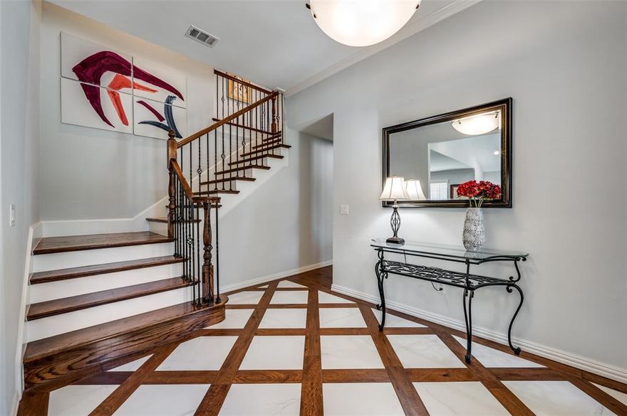 $10,000 PRICE IMPROVEMENT! Discover this breathtakingly updated, single owner-builder home: a true masterpiece of design and comfort. This exquisite property boasts four bedrooms, three baths, an incredible sunroom, which is also ideal as a study-office, two spacious living areas, and a formal dining room. Every detail has been meticulously considered, from the stunning pattern of inlaid tile and engineered, hardwood floors, to the recently updated staircase and banister. The primary bath offers buyers a luxurious retreat including a frameless glass shower, a stand-alone soaking tub, and elegant Silestone shower walls and countertops.  The beautifully updated kitchen is a chef's dream, featuring Corian countertops, stainless double convection ovens, microwave, trash compactor, and dishwasher. The kitchen is also plumbed for gas with downdraft venting available; the separate microwave also serves as a combo exhaust vent. And all of this is complemented by a pantry large enough for all of your bulk purchases. This inviting kitchen overlooks the sunroom-office on one side, providing serene views of the picturesque backyard, while also adjoining the beautifully proportioned formal dining area on the opposite side. The family room, complete with a cozy gas fireplace and logs, seamlessly connects to the living piano room, offering a versatile space perfect for entertaining. 

Other recent, and significant updates include:

Heating system includes both gas 5-ton unit and electric 2.0-ton heat pump.
Exterior eves & siding are of durable Hardie Board Masonite construction.
Partial gutters are installed in color matching Hardie Board eves & siding.
Security is wired. Home has upgraded smoke and carbon monoxide detectors on each floor.
Dryer is plumbed for gas, but currently electric with 220V.

Please refer to the accompanying documents for a comprehensive list of all updates and features.