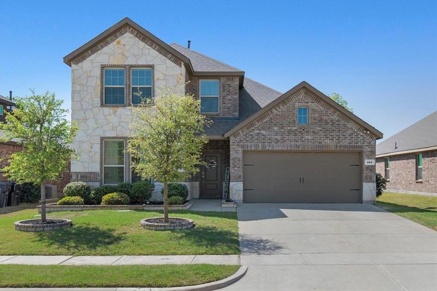 Step into effortless elegance in this beautifully appointed 2-story home in the desirable Trailstone neighborhood of Caddo Mills. At 2,193 sq. ft, this thoughtfully designed residence offers 4 bedrooms and 3 full baths, blending open-concept living with private, purposeful spaces. The dramatic two-story entry with a custom decorative accent wall sets a bespoke tone, while soaring 20-foot ceilings and clerestory windows flood the main living areas with natural light, creating an inviting, airy ambiance throughout the home.
The first floor is anchored by a serene primary suite, privately positioned for convenience and comfort. The ensuite features dual sinks and a spacious walk-in closet—an ideal retreat after a long day. Also on the main level, a secondary bedroom and full bath sit down a private hallway, perfectly suited for guests, multigenerational living, or an office with its own access to a full bath.
Upstairs, wide-cased stairs lead to two additional bedrooms, another full bath, and a secondary living room or flexible loft an excellent space for a playroom, media room or homework hub where kids and friends can gather. Thoughtful layout and storage details ensure the home functions as beautifully as it looks.
Outside, enjoy long Texas evenings under a covered patio overlooking a large backyard that backs to a 100-acre open field—offering privacy, panoramic views, and breathtaking sunsets. The yard’s fence includes upgraded decorative metal inserts for added curb appeal and style.
Trailstone residents benefit from community amenities that enrich everyday living: several stocked fishing ponds, expansive green spaces, a community pool with toddler splash pad, and playgrounds—perfect for families and outdoor enthusiasts. Located within the sought-after Caddo Mills exemplary school district, this home offers a rare combination of functional floorplan, scenic privacy, and community lifestyle. Experience the best of neighborhood living-schedule your showing today.
