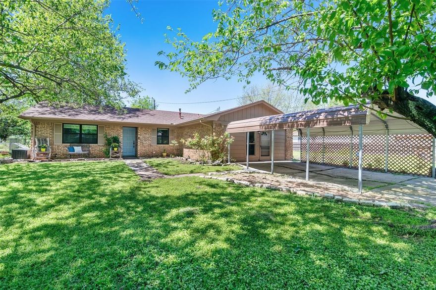 Welcome to your serene retreat in Wolfe City! This charming brick home, boasting 3 bedrooms and 2 bathrooms, is nestled on a sprawling 1.4-acre lot, offering ample space for your family and pets to grow with a dining room and second family room. As you step onto the property, you're greeted by the tranquility of a large secluded treed yard, ensuring privacy and security with a beautiful privacy fence and rolling gate. A spacious 50x30 barn provides ample storage or workshop space, along with a tornado shelter offering peace of mind during stormy weather.  Enjoy the convenience of hosting gatherings and barbecues on the covered patio, ideal for entertaining friends and family year-round with a hot tub and above-ground pool! All appliances included, along with the washer, dryer, and deep freeze, this well-equipped property offers the perfect blend of comfort, functionality, and charm. Come see this Wolfe City gem in person!