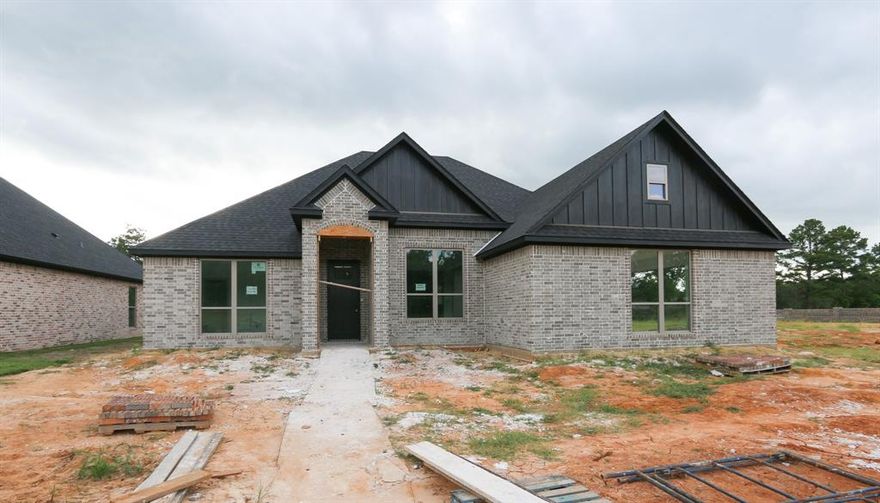 This new construction home is located in a gated subdivision in a serene country setting minutes from everything that S. Tyler has to offer! Live like royalty in prestigious Crown Point Estates II as this planned development consists of only 21 lots total with HALF ACRE LOTS. The exterior of the home is brick with a 10' and 12' pitch roof and grand entrance. This home has 4 bedrooms PLUS a formal dining, HUGE gourmet kitchen, 2.5 bathrooms, and 2 car side-entry garage. Featuring many high-end features including wood floors, solid countertops, custom cabinets, designer lighting, gas cooktop, lots of moldings and trim work, fireplace, shower and separate garden tub in master bath, 13' ceilings and more! There is an amazing oversized covered patio to enjoy the large backyard with privacy fence! High-speed internet and cable is available through Optimum! Welcome to YOUR new Home!!