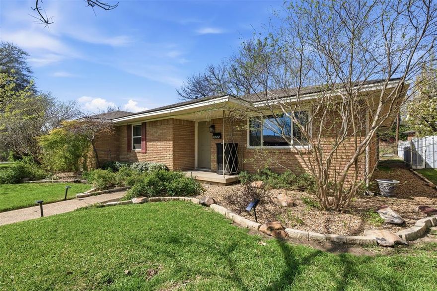 Tucked into an established Oak Cliff neighborhood, this 3 bedroom, 2 bath brick home blends comfort and functionality in a well-designed floor plan. The home has a balanced blend of open concept and dedicated areas. A spacious living room flows into the kitchen and a large dining area...ideal for both everyday living and entertaining. The kitchen provides ample cabinet storage and workspace, with convenient access to the attached rear entry garage for easy unloading. The private primary bedroom has its own ensuite bath and walk-in closet, while two additional bedrooms share a full hall bath. Inside, you’ll find many sought-after features...hard wood flooring and ceramic tile throughout, fully updated kitchen and baths, brand new paint, newer vinyl windows, a whole-home surge protector, a recently replaced water heater, and an HVAC unit less than 5 years old! The stainless refrigerator and washer and dryer will also stay with the home. From the tidy curb appeal to the functionality, the outside space offers a lovely extension of livable area. The front has been xeriscaped with mature, low maintenance landscaping. The backyard features a 15x20 deck and a 10x12 storage shed that is all securely contained within 8ft wood privacy fencing. The attached garage offers additional storage and parking convenience with an alley configuration. Easy access to major thoroughfares, shopping, dining, and Bishop Arts District, this home presents a fantastic opportunity. Don’t miss your chance to own in this desirable Dallas location!
