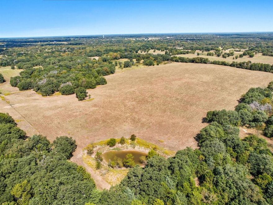 Just 30 minutes east of Dallas, this beautiful 68.76-acre, ag-exempt tract is part of an available 117-acre East Texas estate and offers a rare blend of natural beauty, privacy, and heritage. Gently rolling Tifton pastures are framed by multiple stocked ponds that draw wildlife year-round. Held by the same family for more than 120 years, this legacy property is fully fenced and gated and ready for its next chapter. With multiple prime build sites, it is ideal for a private ranch, equestrian estate, or forever home with panoramic country views. Additional acreage is available (MLS number 21091545) if you would like to expand your footprint and control the surrounding landscape. Bring your builder, your plans, and your vision. The possibilities here are wide open.