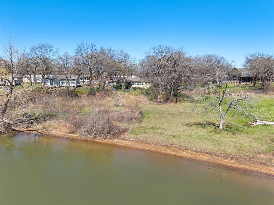 Rare opportunity to own lakefront land in the highly sought-after community of Little Elm. This unimproved parcel offers direct access to beautiful Lewisville Lake, providing the perfect canvas to build your custom dream home with stunning water views and unforgettable sunsets. Enjoy peaceful shoreline living with room to design your ideal outdoor oasis. If you’ve been searching for a true waterfront homesite in DFW, this is a rare find you don’t want to miss.
