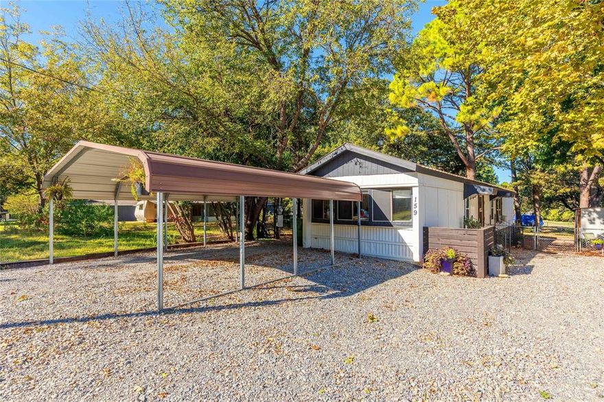 Lake property with beach access.  Whether you plan on using it as a get a way or an income producing property, this place should be on your list.  Very well maintained Lake Home with deck, storage shed and a fenced in backyard for your animals.  Vinyl flooring for easy cleaning with exception of bedrooms.  Furniture negotiable