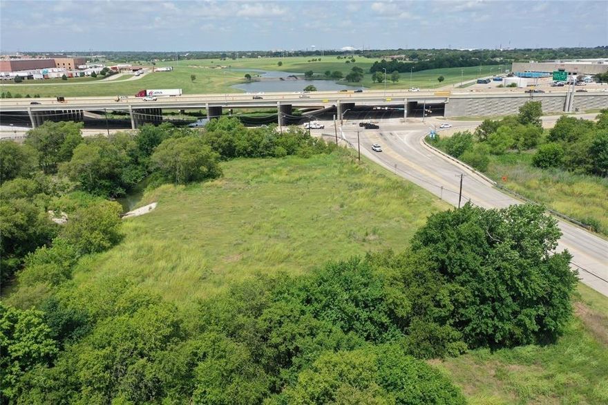 Over 2.5 acres of unimproved land in the upcoming area of Grand Prairie! Corner lot right off the service road of President George Bush Tollway. Prime location can't be beat! This area of Grand Prairie has grown tremendously in the last 3 years alone. Bring your business or personal ventures to life.