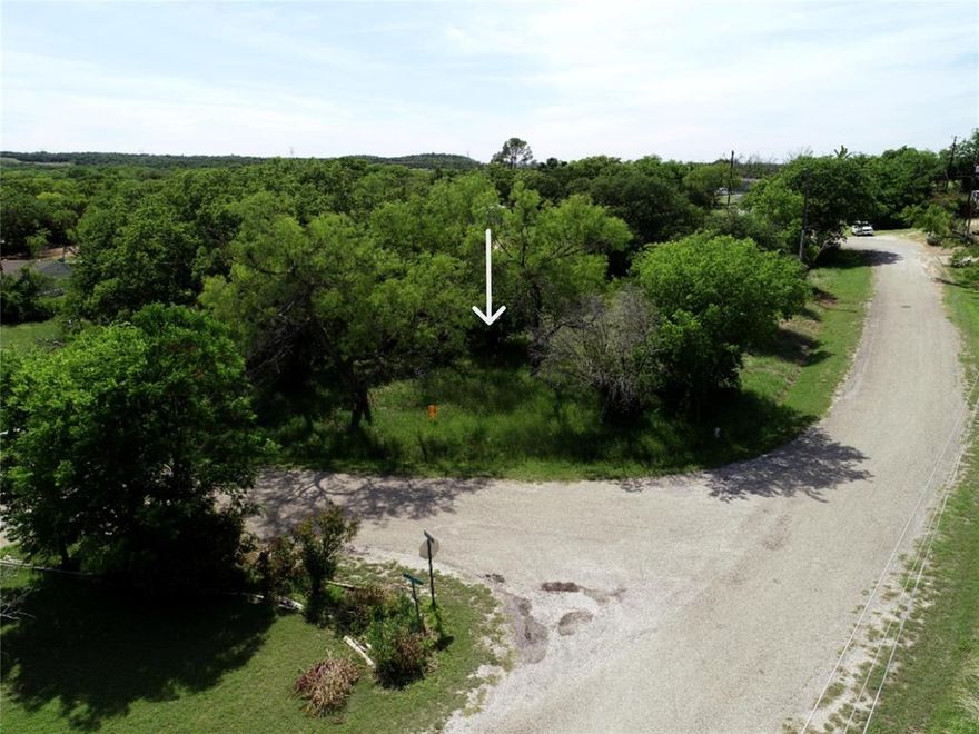 0.21-acre (9,222 sq ft) corner lot at Highland Dr & Highland Ct offering excellent access and flexible build options. Ideal for new construction or a mobile home (5 years or newer). Peaceful, tree-lined setting with nearby utilities (buyer to verify). Septic required. Conveniently located near the river and surrounding development.