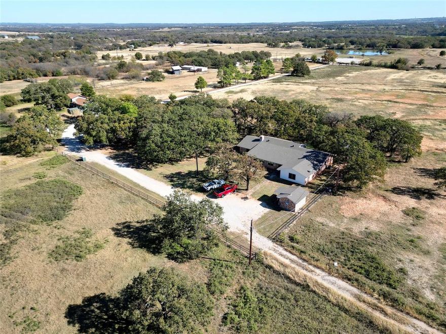 This incredible ±182 acre tract sits just a half mile south of Hwy 380 on Cuba Road — an easy
commute into Denton or Fort Worth. The land is mostly level with gentle elevation changes and
features four tanks-ponds, cross fencing, and even a small pear orchard.
Once a renowned thoroughbred horse operation, the property includes two barns. Three existing
homes are already in place, making this an ideal candidate for a personal ranch or family compound —
and the land currently carries an ag exemption.
With extensive frontage along Cuba Road, this property also offers strong potential for future
development. West Wise water may be available. The property is currently served by a private water
well. No known housing restrictions.
Great elevation — you can see the historic Wise County Courthouse from here. This special family farm
is a rare gem with many potential uses given its highly desirable location.