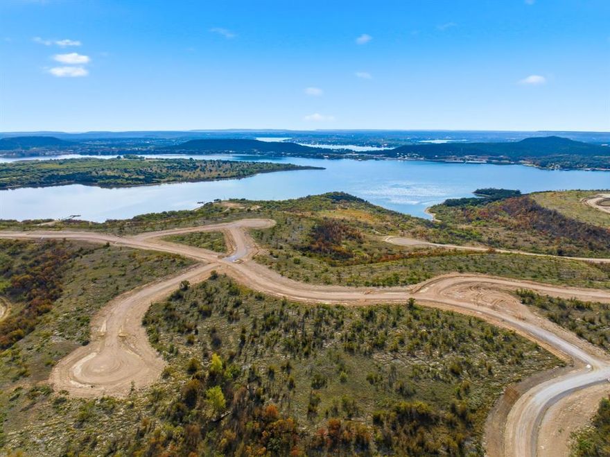 Discover the perfect opportunity to build your dream lake home on this beautiful lot located on the west side of Possum Kingdom Lake inside the gated community of Clearwater Point. This property offers stunning views of the sparkling water and the surrounding rolling hills, providing the ideal back drop for peaceful mornings and unforgettable sunsets. This lot is ready to build on, with easy access from a private road and a layout that works perfectly for full time living or a weekend getaway. Community guidelines ensure consistent architectural standards with attractive exterior materials like, stone, stone veneer, masonry siding, or cedar for a unified, upscale streetscape. Whichever you envision this property gives you the freedom to create it. Enjoy all that Possum Kingdom has to offer, with this prime location, captivating scenery and a build ready status, this lot is a rare find and an exceptional opportunity. Come see why Clearwater Point is one of Possum Kingdoms hidden gems and start building the lake lifestyle you've always wanted.
