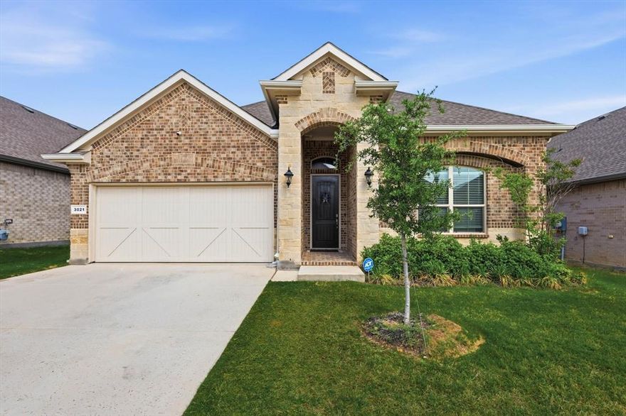 Move-in ready and designed for modern living, this spacious 4-bedroom, 2.5-bath home offers comfort, style, and convenience in a prime Argyle location. Featuring a desirable split-bedroom floor plan, everyone can enjoy their own private space. The open-concept layout is perfect for entertaining, seamlessly connecting the kitchen, dining, and living areas. The kitchen boasts abundant cabinetry, a pantry for extra storage, quartz countertops, and a stylish side counter ideal for a coffee bar or serving station. The primary suite provides a relaxing retreat, while the additional bedrooms offer flexibility for family, guests, or a home office. A 2-car garage with epoxy-coated flooring adds durability and a polished finish. Step outside to the covered patio, where you can unwind and enjoy peaceful evenings. Conveniently located near major highways and interstates, this home offers easy access to Tanger Outlets, Buc-ee’s, Texas Motor Speedway, and is less than 45 minutes from DFW Airport. This beautiful home is ready to meet all your needs.