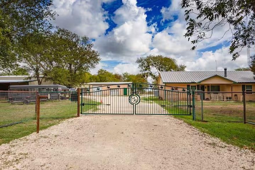 You will want to make sure you look at ALL pictures! Stunning multi-use horse property offering residential comfort, income potential, and equestrian functionality. This property features a 3 bedroom, 2 bath home, comes almost fully furnished, two other livable spaces, huge shop that has been utilized to hold events, as well as extensive improvements throughout. The 3B 2B home was renovated approximately two years ago and includes knotty alder cabinets in the kitchen, bathrooms, and laundry. Ceramic wood-look tile runs throughout with carpet in bedrooms. Additional features include double pane fold-in windows with transferable lifetime warranty, wood burning stove, updated HVAC approximately four years old, and water heater replaced approximately two years ago. Exterior includes hardwired security cameras and antenna system connected throughout. Property includes a 30x60 covered RV building with full hookups. Multiple RV hookups are located throughout. Equestrian improvements include full perimeter and cross fencing with pipe top rail and no-climb wire. Horse barn five covered stalls with runs, feed room, lighting. Property also includes turnout areas, holding pen, frost free water. Indoor dog kennel with wash station and on demand hot water, two gated entrances, divided yard spaces, and individual water shutoff valves to each structure. Large shop offers multiple roll up doors and ample workspace. Ideal for horse enthusiasts, multi-use living, multi-generational living.
