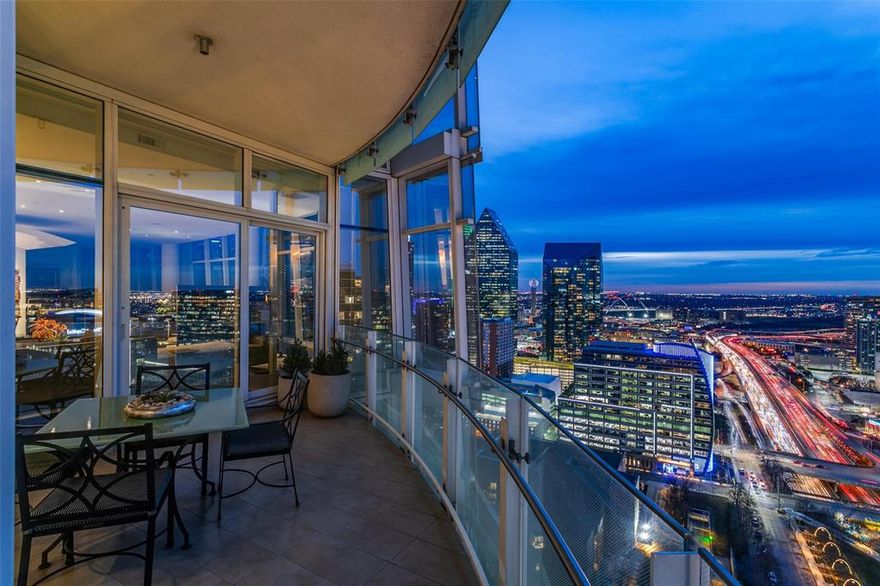 Elegant simplicity, inviting warmth, amazing openness in highly desirable north endcap in Museum Tower, Dallas’ premier high rise. Enlarged living areas serve comfortable daily living & spacious, gracious entertaining. Attention to detail, smooth transitions w great flow, natural light deep within and well-utilized space. Natural elements include eucalyptus paneling, walnut floors and marble counters. Custom remodel by Sebastian; interiors in collaboration with Allan Kirsch. Sweeping 315 degree views capture architectural masterpieces and magical sunrises, sunsets & stunning twilights. Easy modification for 3rd bdrm without compromising living space or views. Hi-efficiency protective film w motorized shades on NW sides. 4 reserved parking spaces & 2 bsmt storage units. Fabulous social community w unparalleled amenities + elevated services: house car, 24-hour valet-front desk, exclusive elevator use, large terrace w great lawn, weekly happy hour and more. The ultimate lock-and-leave.