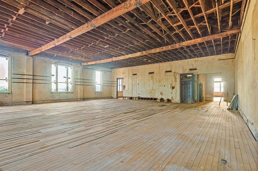 Renovate for +5,000 SF single family upstairs and 8,000 SF garage with storage mezzanines, or build out four to eight loft apartments. This historic brick building in downtown Hillsboro, Texas has 23 new windows, newer roof, new framing and floor repairs, 13,029 sf building on an 11,550 lot with approved permits ready to build 4 custom loft apartments or office, fenced asphalt parking lot with up to 22 parking spaces, 16’ ceiling heights, two 14x12 and one 12x12 drive doors, bathrooms rough-plumbed, temporary electric service connected, ready for build-out. 
-
Located across from Brookshire’s grocery with traffic of 9,573 vehicles per day. In the CBD for Hill County, one block to the County courthouse and Hillsboro Town Square. Five minutes to new $50M Buc-ee's and Super Walmart. Hillsboro is 55 minutes south of Dallas and Fort Worth at the fork of I-35 W and I-35 E, and 35 minutes north of Waco in the Texas Golden Triangle.