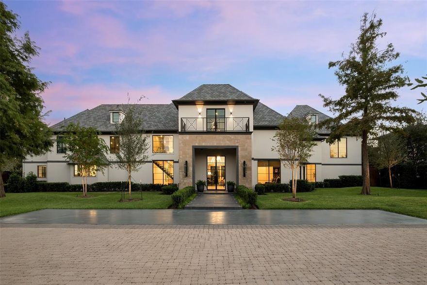 Beautifully expanded and reimagined this exceptional estate is located in the sought-after Strait Lane corridor of Preston Hollow. Set on 1.2 acres of lush, gated grounds, the property offers privacy and security. The main residence is ideal for both entertaining and everyday living, with interiors filled with natural light, expansive walls, and high ceilings. The first floor includes a grand foyer, formal living and dining rooms with a temperature-controlled wine room, media room, and family room that also lives as a lounge. The gourmet kitchen is complemented by a secondary catering kitchen, butlers pantry, and walk-in pantry. The dual-level primary suite includes a private outdoor spa. Four additional bedrooms are located upstairs, along with flexible accommodations and additional entertaining space. A 2, 300 sq ft architecturally significant pool house features vaulted ceilings, living and dining areas, two bedrooms, and two bathrooms. A covered terrace provides expansive outdoor living with views of the 22' pool, sports court with pickleball and basketball, putting green, and manicured lawns. Situated at the end of Lennox Lane, the home offers a dramatic approach and convenient access to top Dallas schools, shopping, and dining.