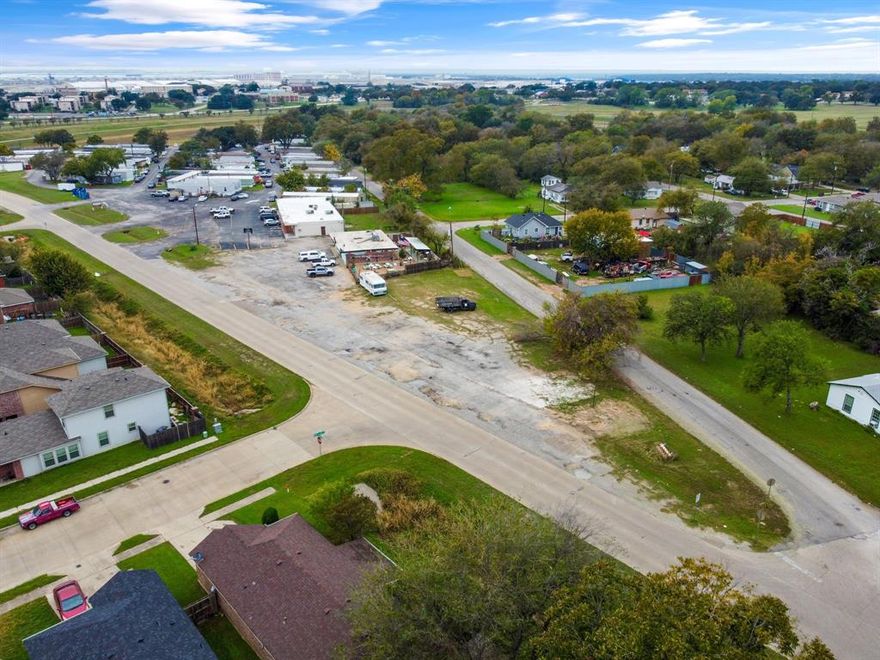 On the west side of Fort Worth, this nearly quarter of an acre commercial lot has huge potential. Zoned E - Neighborhood Commercial, the property offers many options for an owner-user or investor. Bring your plans and imagination.