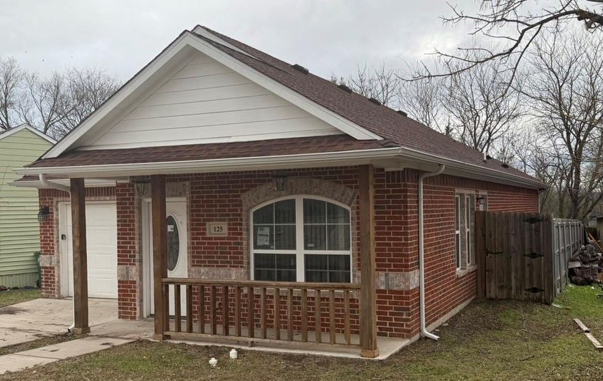 This nearly new  2020 build three bedroom two bath home in Waxahachie is full of charm at an amazing price! The brick and stone with wood accents on the exterior welcomes you in  to find an open and spacious floorplan. Once you enter the front door ,the tray ceiling with recessed lighting and ceiling fan contributes to the wide open feeling. The kitchen sports white cabinets and granite type hard surface counter tops and stainless appliances with a stainless farmhouse sink. This home has laminate wood look hard surface flooring or tile throughout. The bathrooms also have granite type countertops and tile flooring. Although it is very close in proximity to the railroad tracks, buyers touring the home have noted how quiet it is even when a train is going by due to the fact that it is a fairly new build with apparently good insulation contributing to the quiet and serene atmosphere inside the home! This home will not disappoint! Don't miss your chance to make it yours! This home is a corporate owned home. Please see offer instructions in transaction desk to submit an offer.