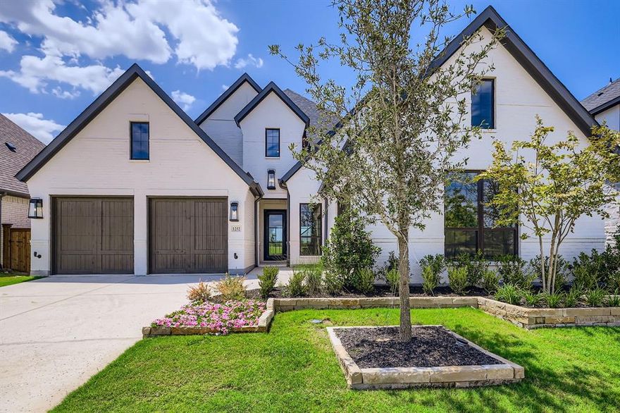 Discover luxury living at 1252 High. This 3,934 sf home features 4 bedrooms, 4 full baths, and a powder room. The painted brick exterior complements bronze windows and onyx shingles, creating a striking façade. Inside, the foyer opens to stunning views of The Tribute Golf Course through multi-sliding doors. Enjoy a gourmet kitchen with high-end appliances and custom cabinetry. The primary suite boasts cathedral ceilings and a spa-like bathroom. Upstairs, a game room and media room offer entertainment spaces with balcony views of the greens. This property promises refined elegance and exceptional lifestyle amenities. Available March 2025!