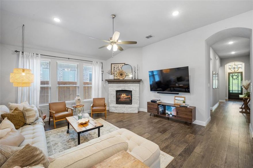 Wow!! Located in sought-after Trinity Falls. Over 1700 sqft of pure delight. You will feel as though you’ve walked into a model home. The open living room with open concept kitchen, over-sized island that is made for entertaining. Private owner’s suite complete with spa bath. This home is about creative spaces – a hidden bar and private desk area complete with barn door. Don’t miss the cozy backyard with extended deck and covered patio. This is a must see!