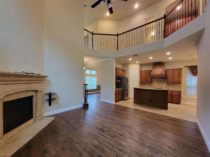 Looking for the perfect blend of work and family life? Look no further than this lovely home, located in North Irving. With easy access to top shopping and entertainment centers in North Irving, Coppell, and Southlake, everything you need is just a short drive away. Plus, you'll enjoy the convenience of living just a short walk away from one of DFW's most premier public chartered schools, Great Hearts. 
This beautiful two-story home features 4 bedrooms and 3.1 baths. Downstairs, you'll find a spacious master bedroom, a large living room, a second living area that could easily be used as a dining room, and an open kitchen. Upstairs, there are 3 more bedrooms and a media room. The home boasts tall ceilings, 8-foot doors, granite countertops, stainless steel appliances, beautiful hardwood floors in the living areas, plush bedroom carpets, and many other upgrades. Comes with a low-maintenance backyard.