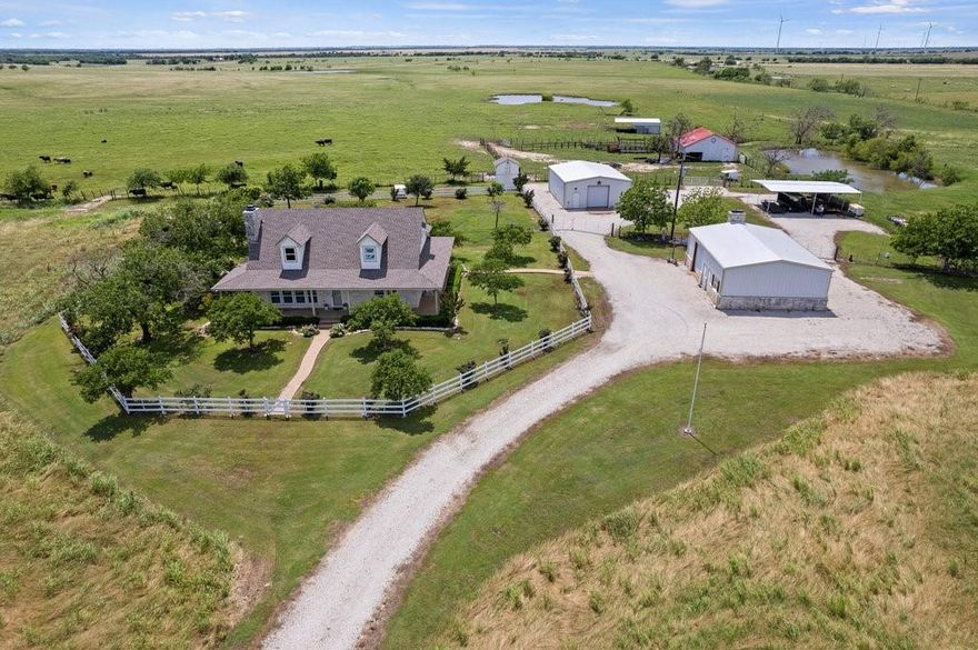 Here's your Texas ranch! 242 acre working cattle spread complete with a gorgeous house, 30x40 metal equipment barn, a 30x40 party barn and plenty of grass and water for your livestock. The home has three bedrooms and two and a half baths. A large family room with a beamed and vaulted ceiling and fireplace awaits your leisure hours. You will love the covered wrap around porches on all  sides. No matter where the sun is shining you will be able to find shady spot. Fish have been stocked in the ponds. Numerous crepe myrtle and oak trees around the house. Entertain your guests in the party barn which includes a roomy open entertaining area with a Texas size fireplace  and roll up doors on two sides.  It also includes a one bedroom, one bath guest quarters and a safe room for shelter from storms. 2500 gal emergency water supply. South of Dallas Ft. Worth and east of Waco, Texas.  For additional compensation the owner will also sell his cattle herd and equipment. Ag Exempt. 6 stock ponds.