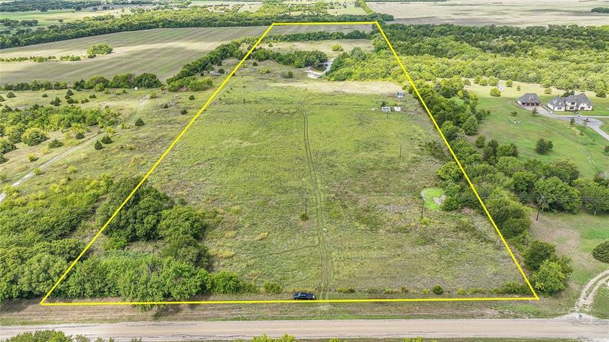 Property is at the top of the hill with beautiful views. Come check out this pristine 34 acres of Ag exempt land with a pond and small fishing dock. Over 500' of road frontage on a FM road. Easements are in place along FM 2729 to extend existing KentuckyTown 4 inch water line approximately 1250 ft to the property. Located in Tom Bean's ETJ and only about 2 miles from Tom Bean, 7 miles from Whitewright and 13 miles from Sherman. Don't miss the Drone Tour in Virtual Tour Link of MLS!